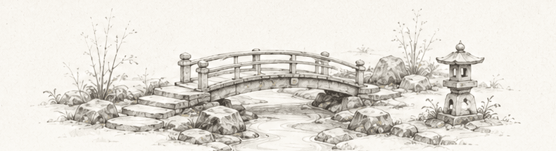 An arched wooden bridge crossing a quiet stream in mist