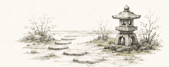 A row of stone lanterns receding into mist, the nearest one lit